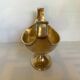 Brass cup emptier