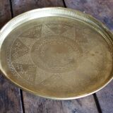 Golden service tray in vintage brass
