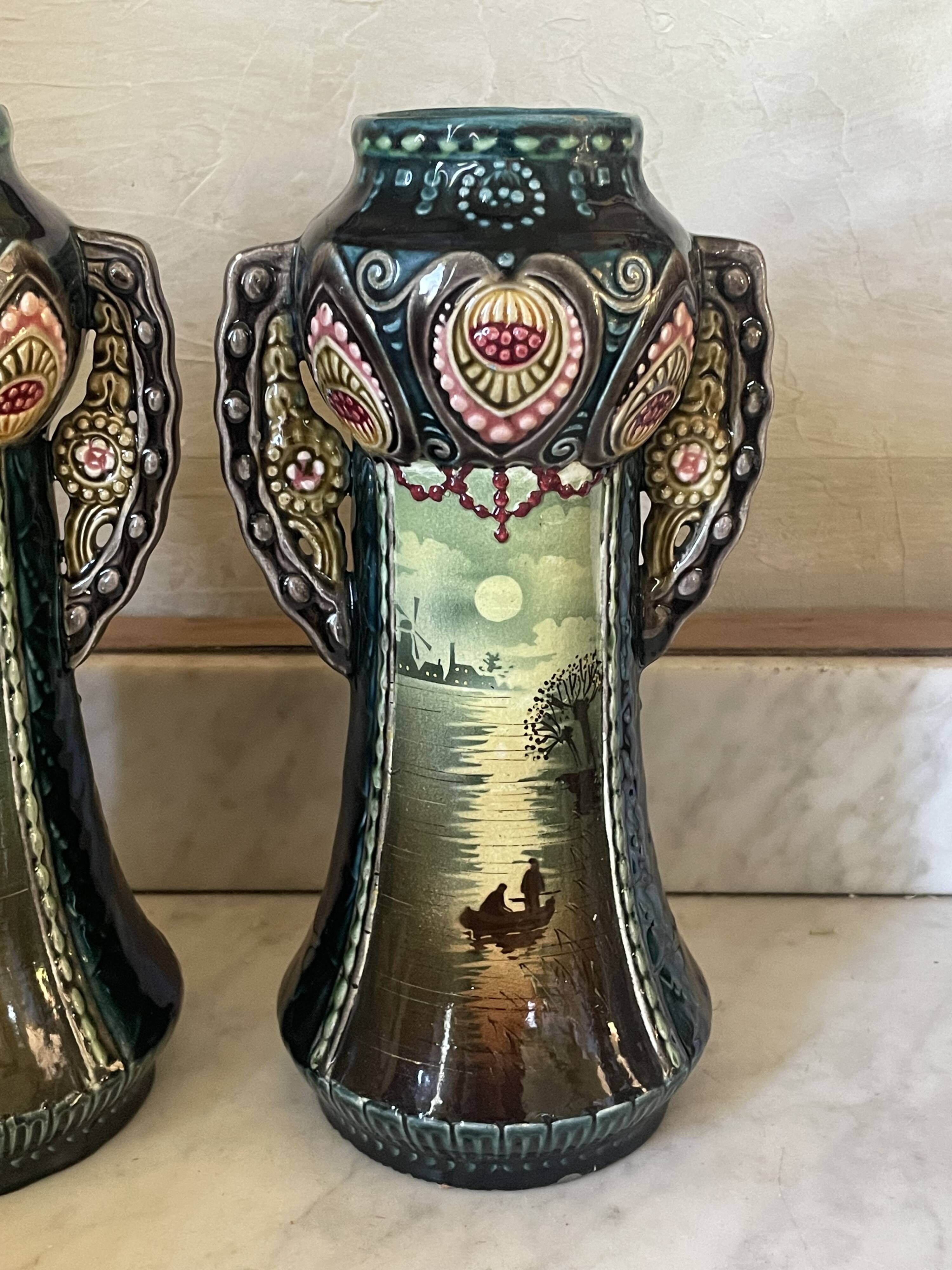 Pair of Art Nouveau slipware vases, hand-painted decoration.