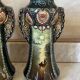 Pair of Art Nouveau slipware vases, hand-painted decoration.