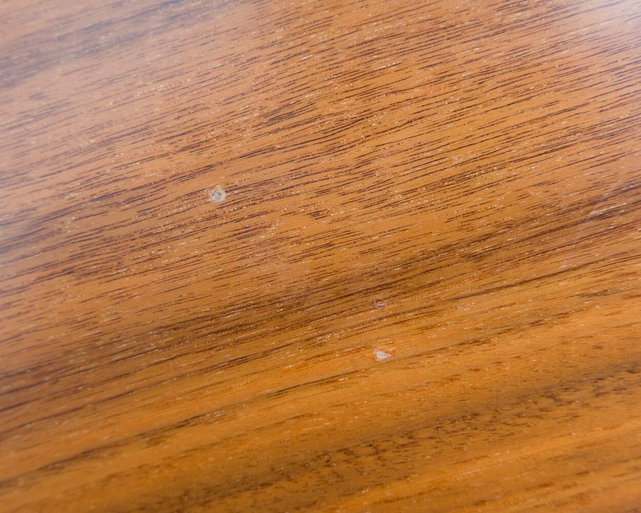 Dining table, 1960s, in walnut, slightly elliptical shape.