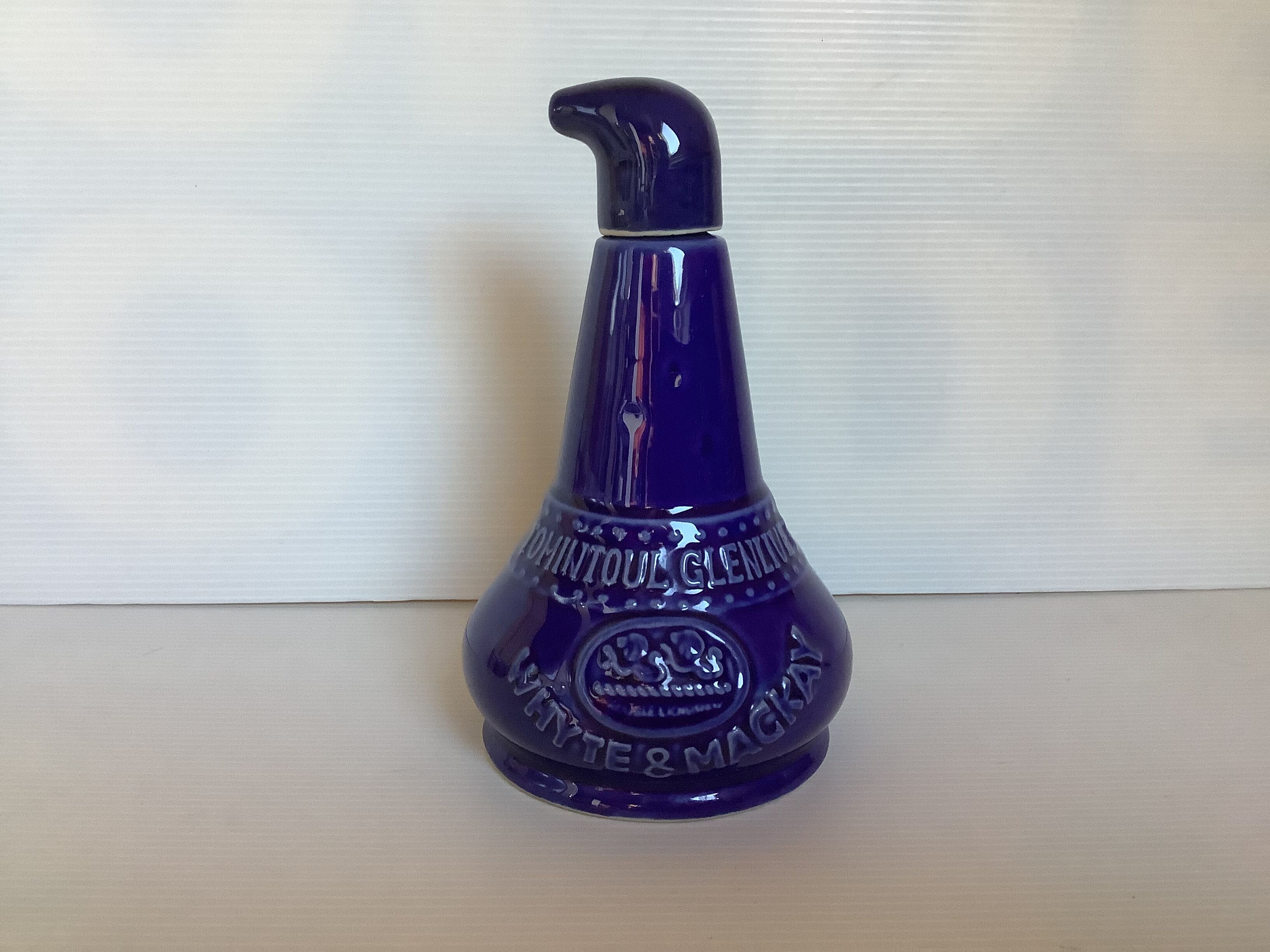 Blue bottle Tomintoul Glenlivet Whyte and Mackay