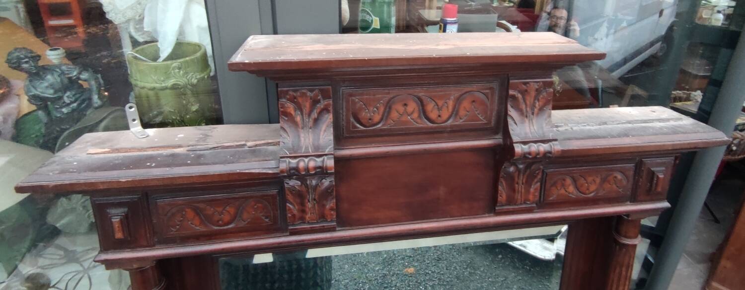 Old large carved wooden mirror