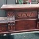 Old large carved wooden mirror