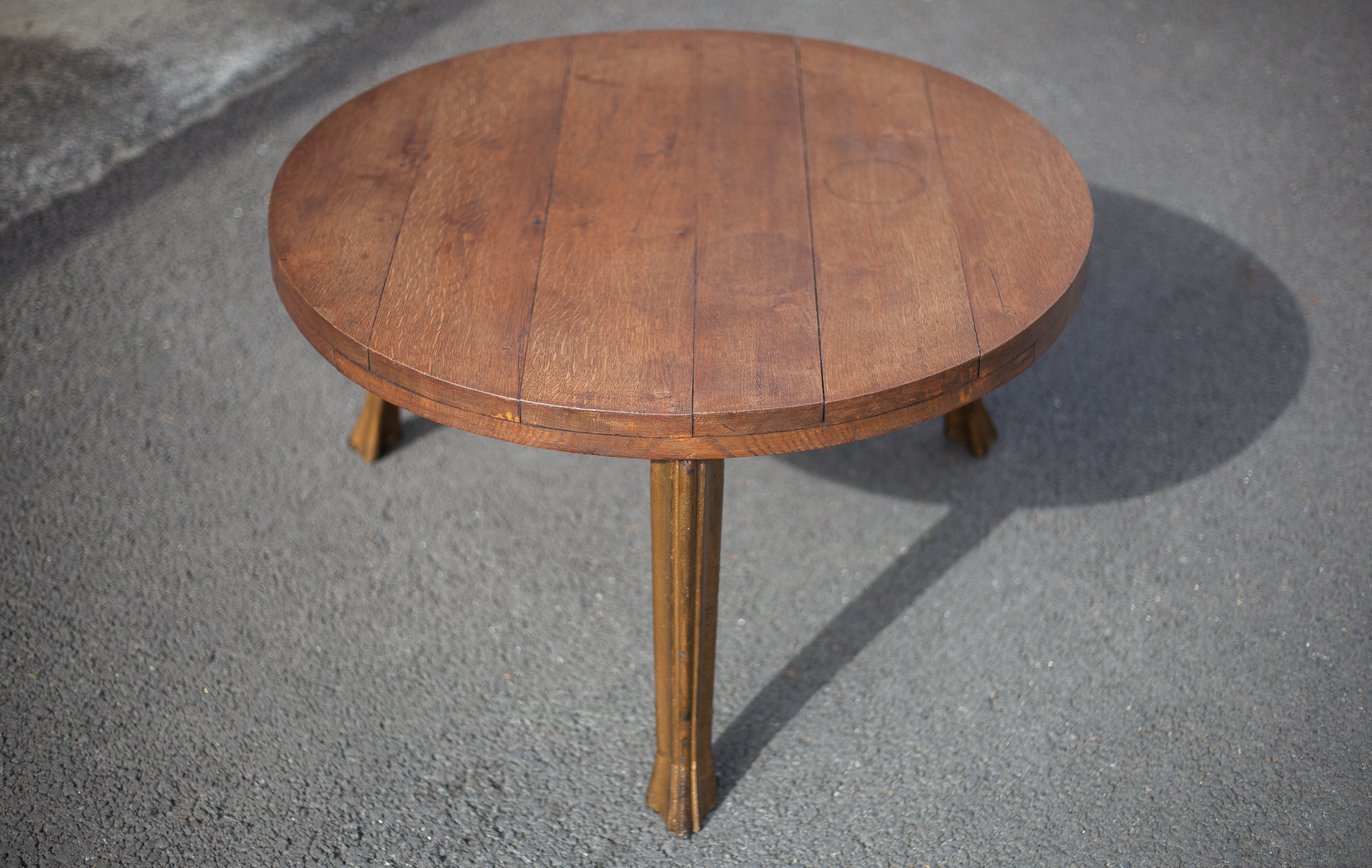 Wooden coffee table with cast iron legs