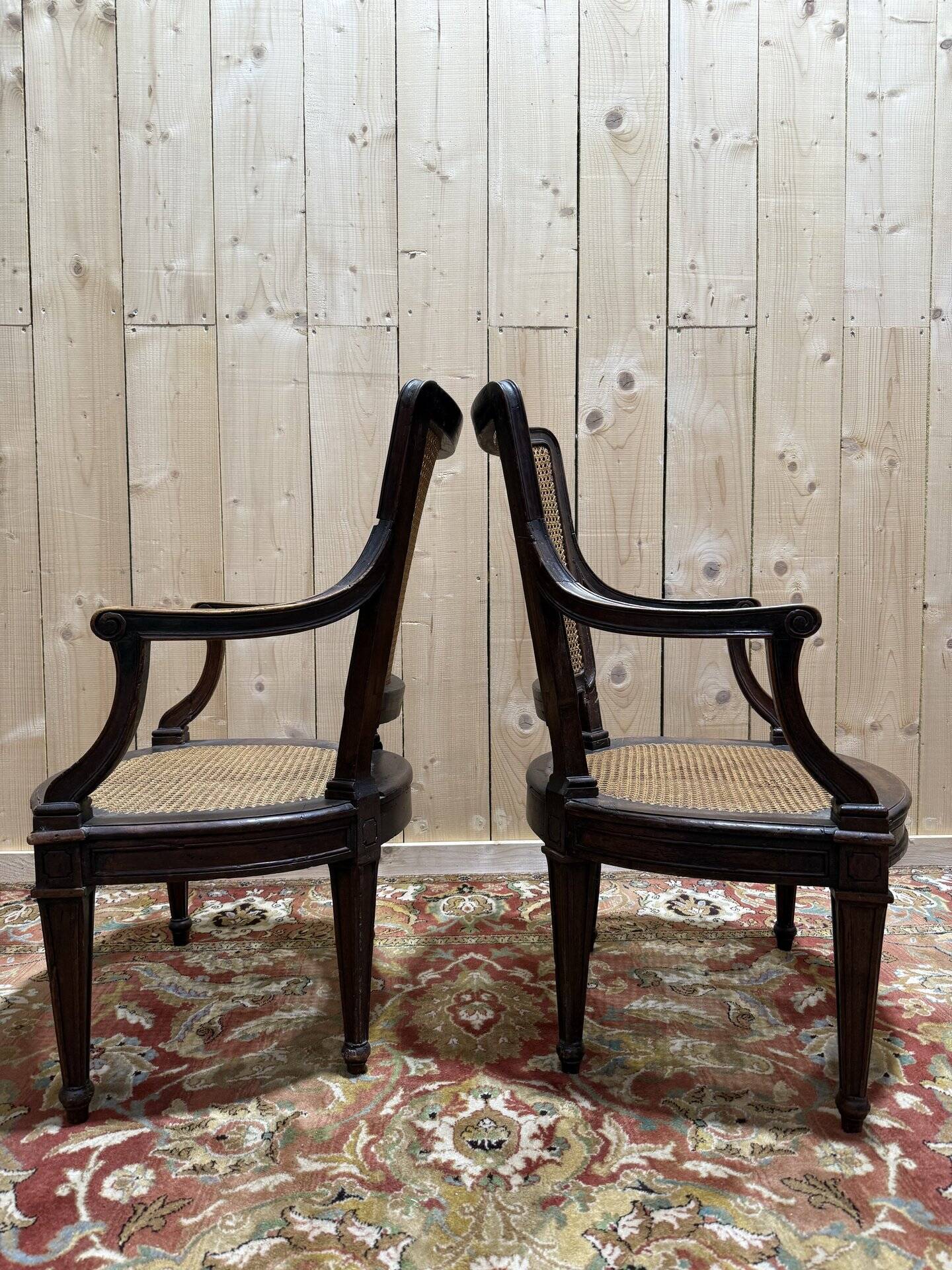 Pair of Louis XVI period caned armchairs