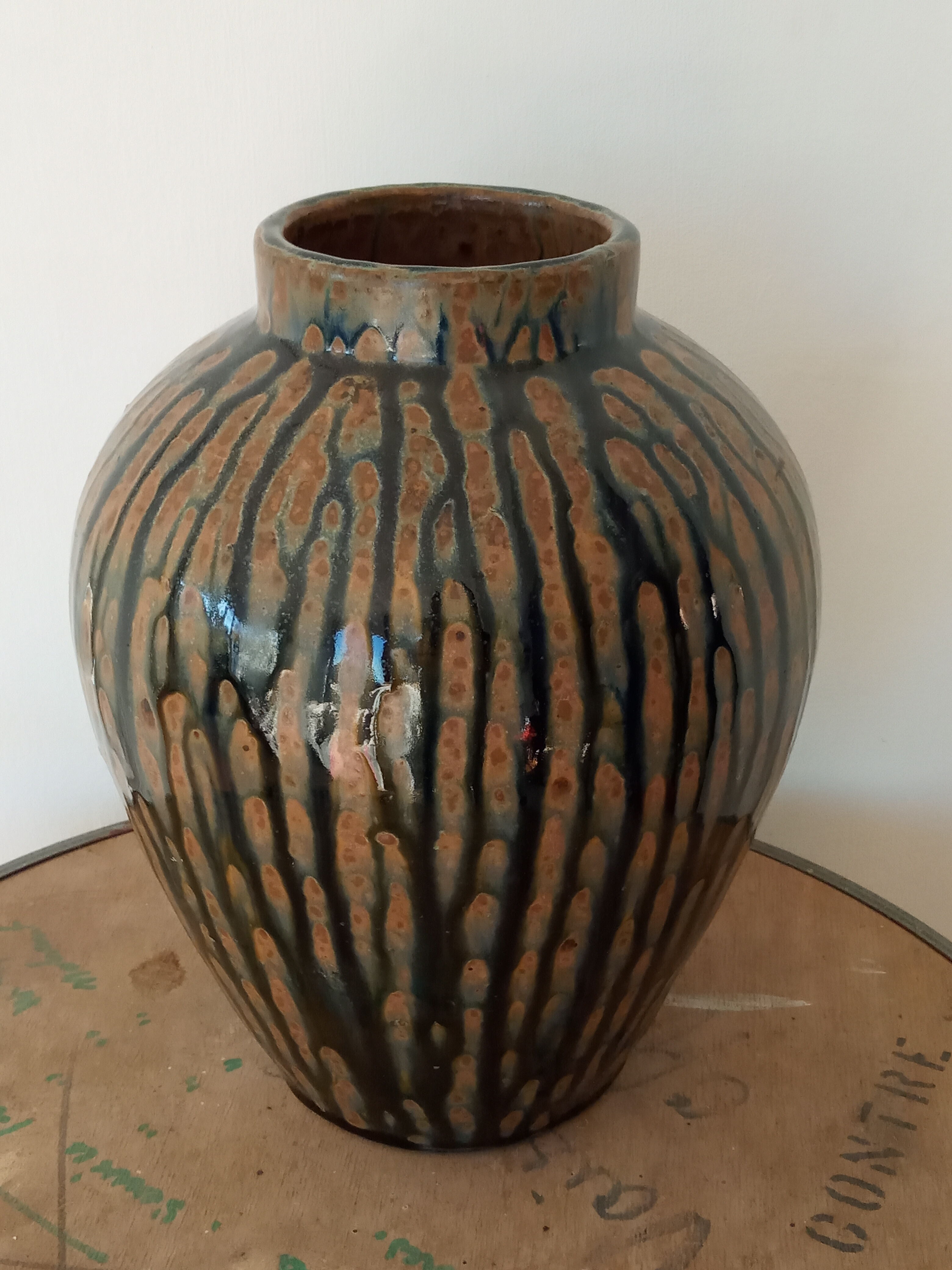 Enamelled sandstone vase