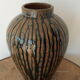 Enamelled sandstone vase