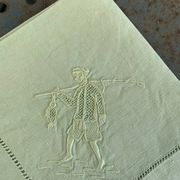 4 small tea towels, mismatched in linen, embroidered, two with flowers and two with fishermen