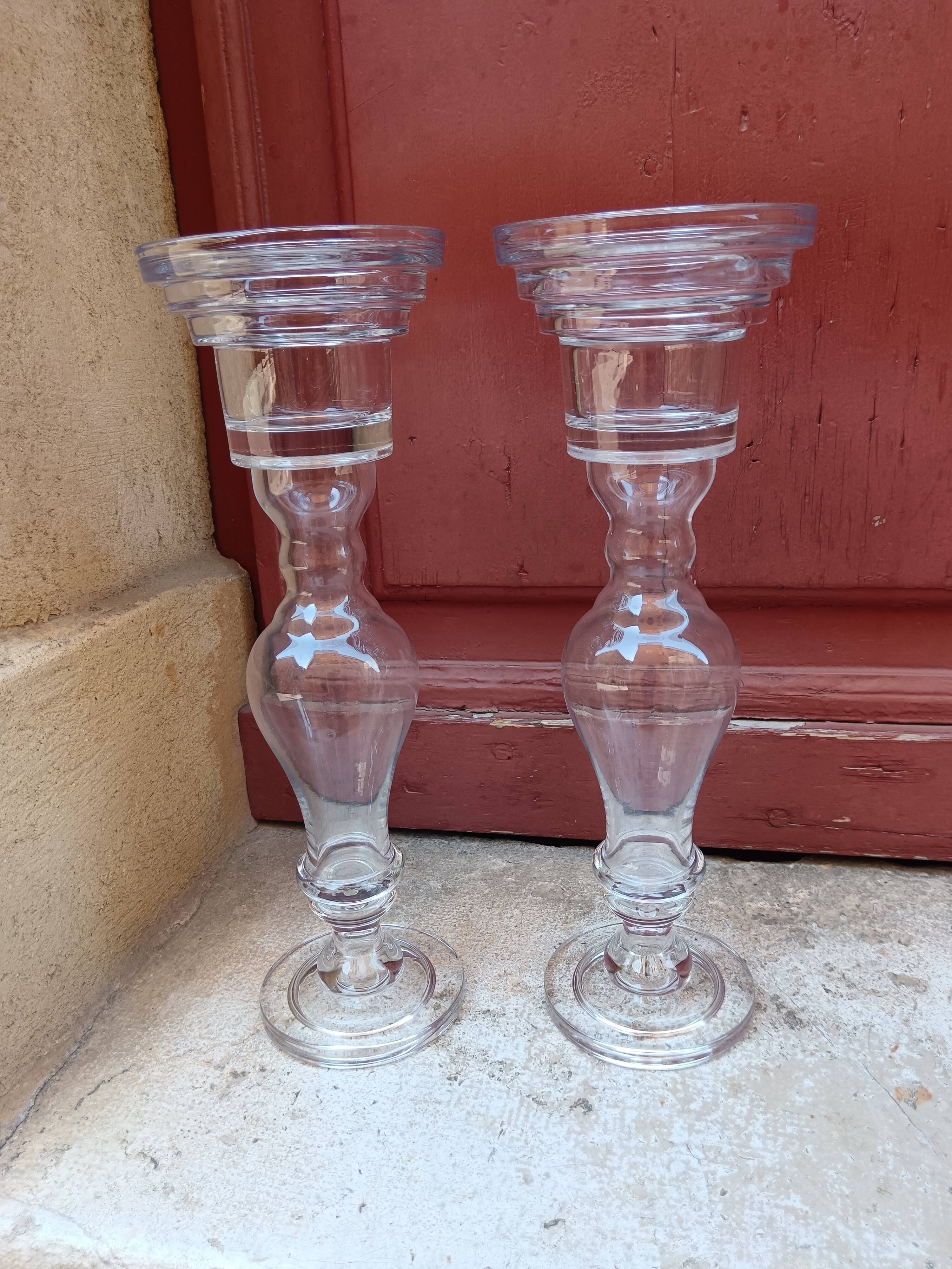 Pair of large glass candlesticks