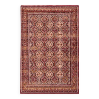 Antique red oriental-style wool rug