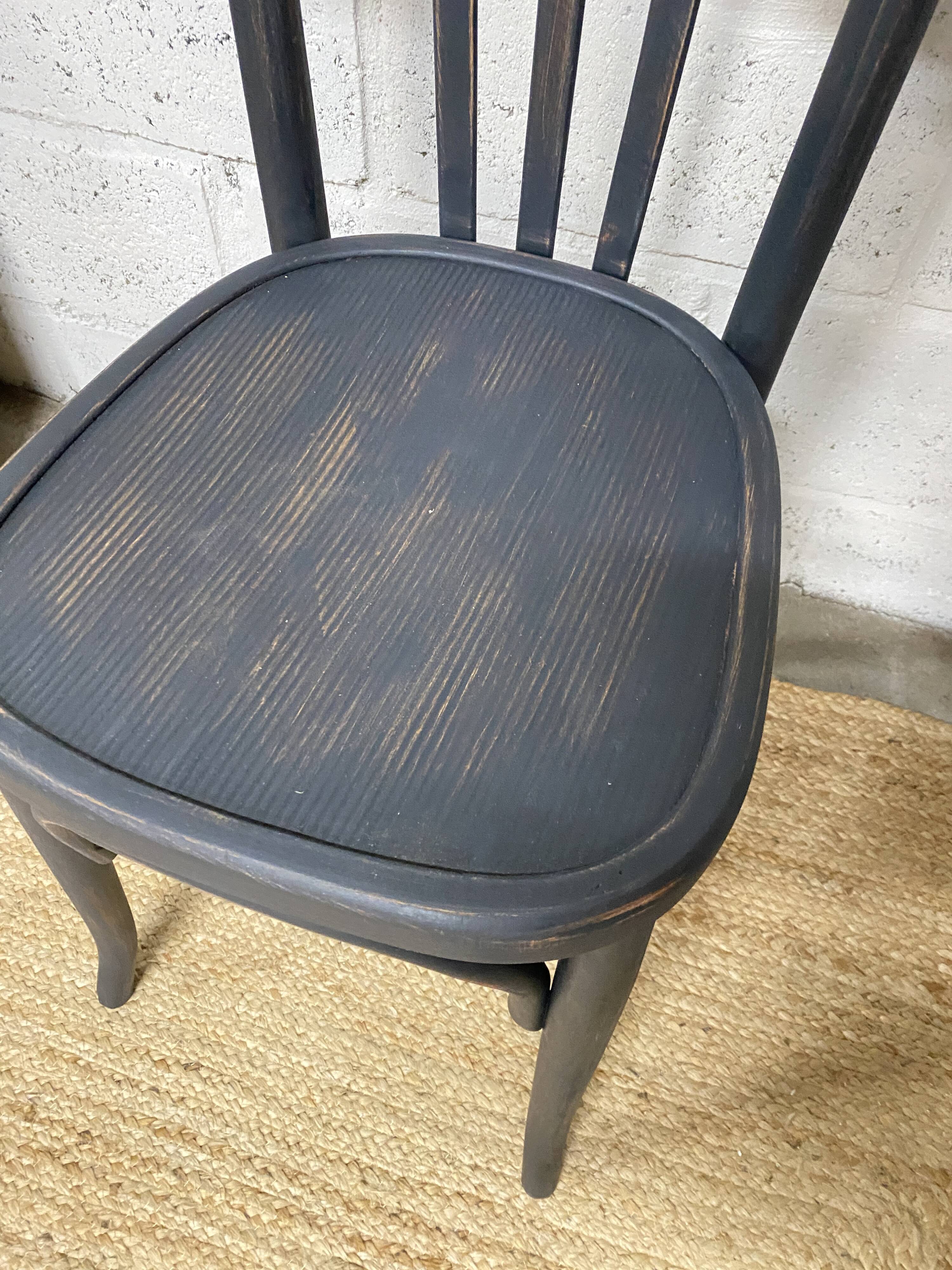 matte black bistro chair with a patina
