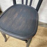 matte black bistro chair with a patina
