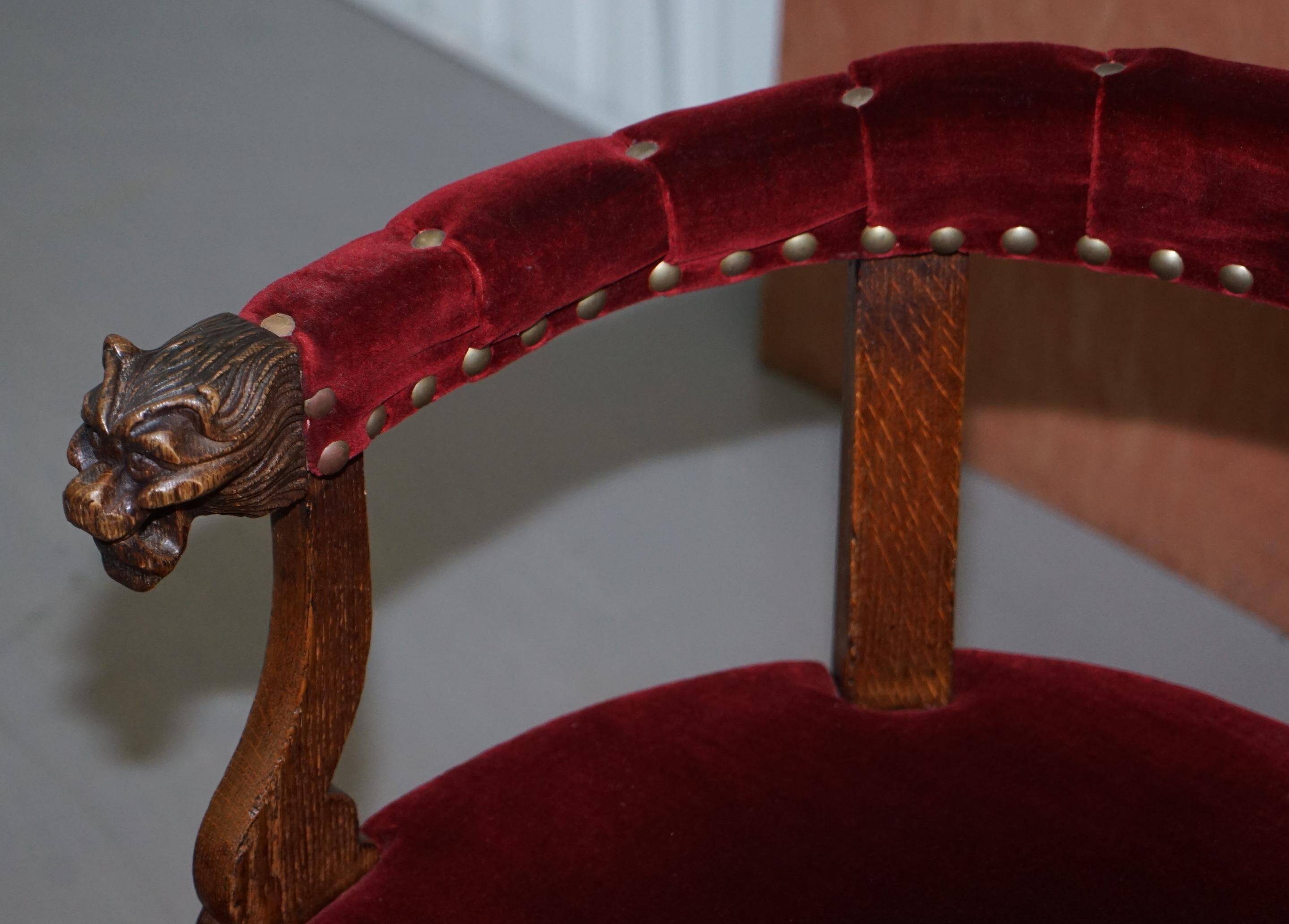 Antique Régence Bergère Armchair in Carved Oak with Lion Head Armrests