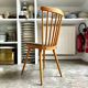 Baumann bistro chair in light wood and green skai, “Menuet” model