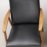 Vintage imitation leather armchair made in Germany