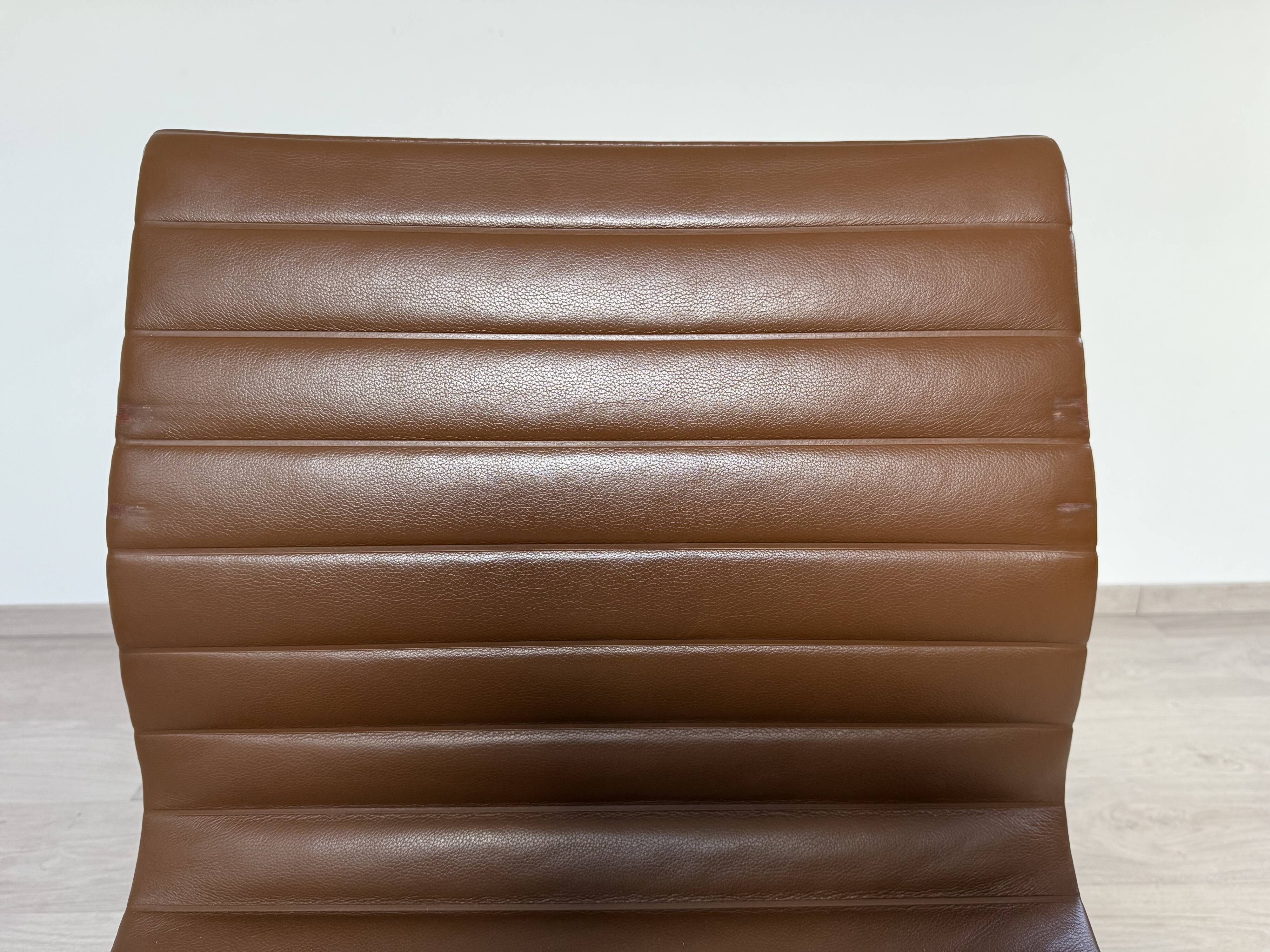 Set of 4 Eames EA105 Vitra armchairs from 2007