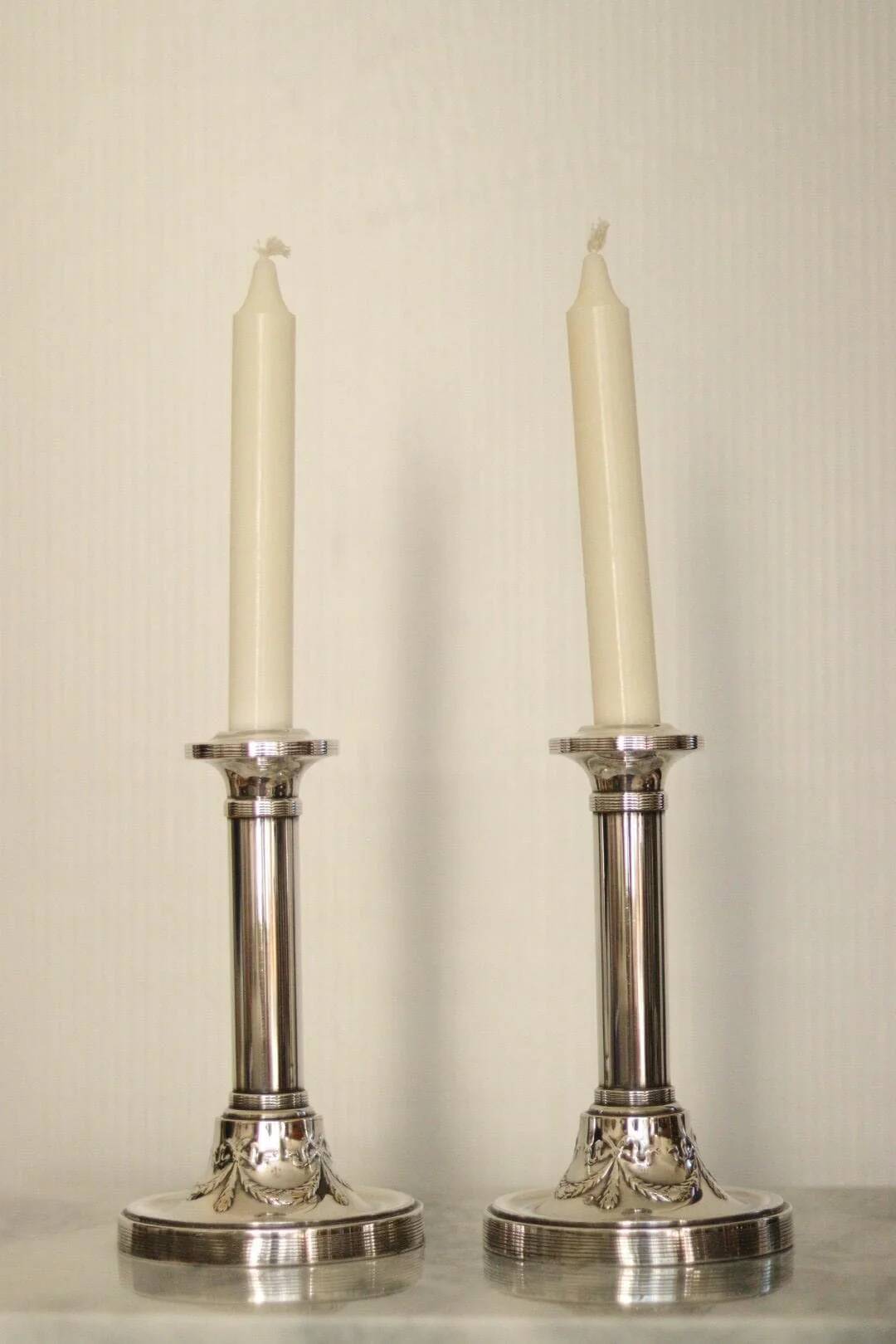 Pair of mid-century silver-plated metal candleholders
