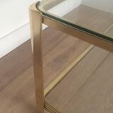 Grande table basse à double plateau en bronze poli et verre signé Jacques Théophile Lepelletier et estampillé Broncz