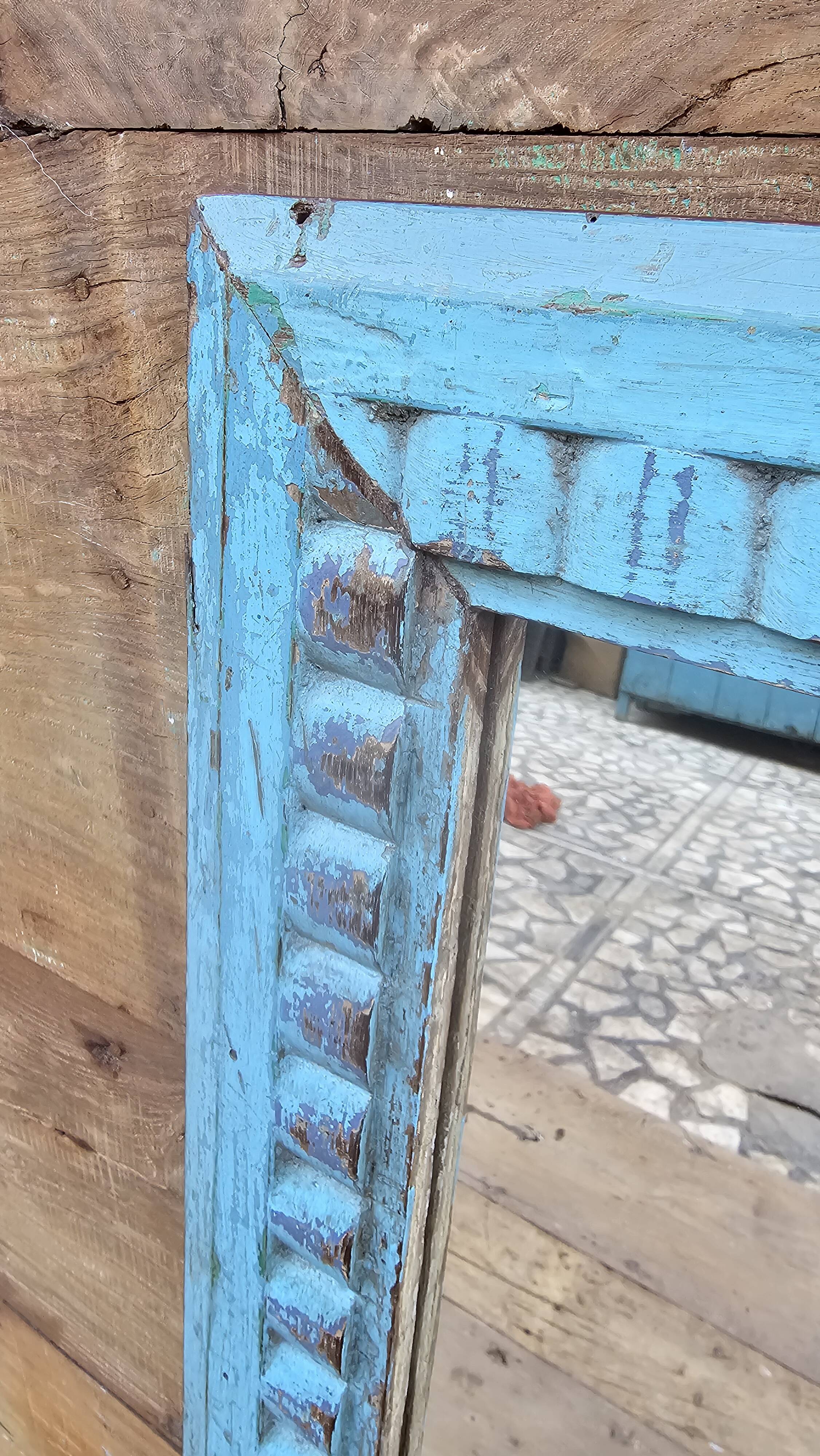 Antique Art Deco mirror in Burmese teak.