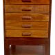 Former antique Burmese teak workshop cabinet with top glass tray