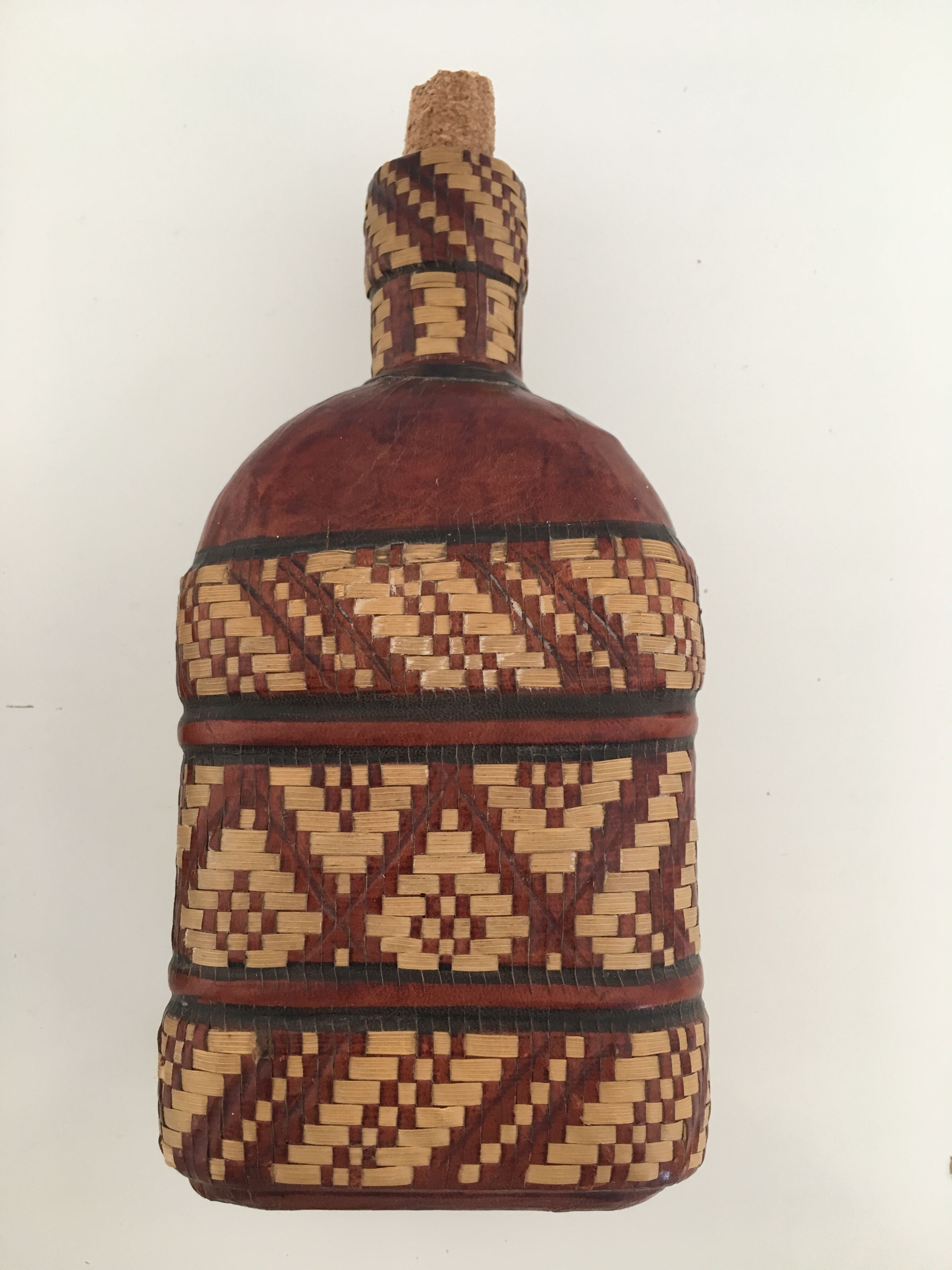 Lot of 2 ethnic leather-wrapped bottles and box