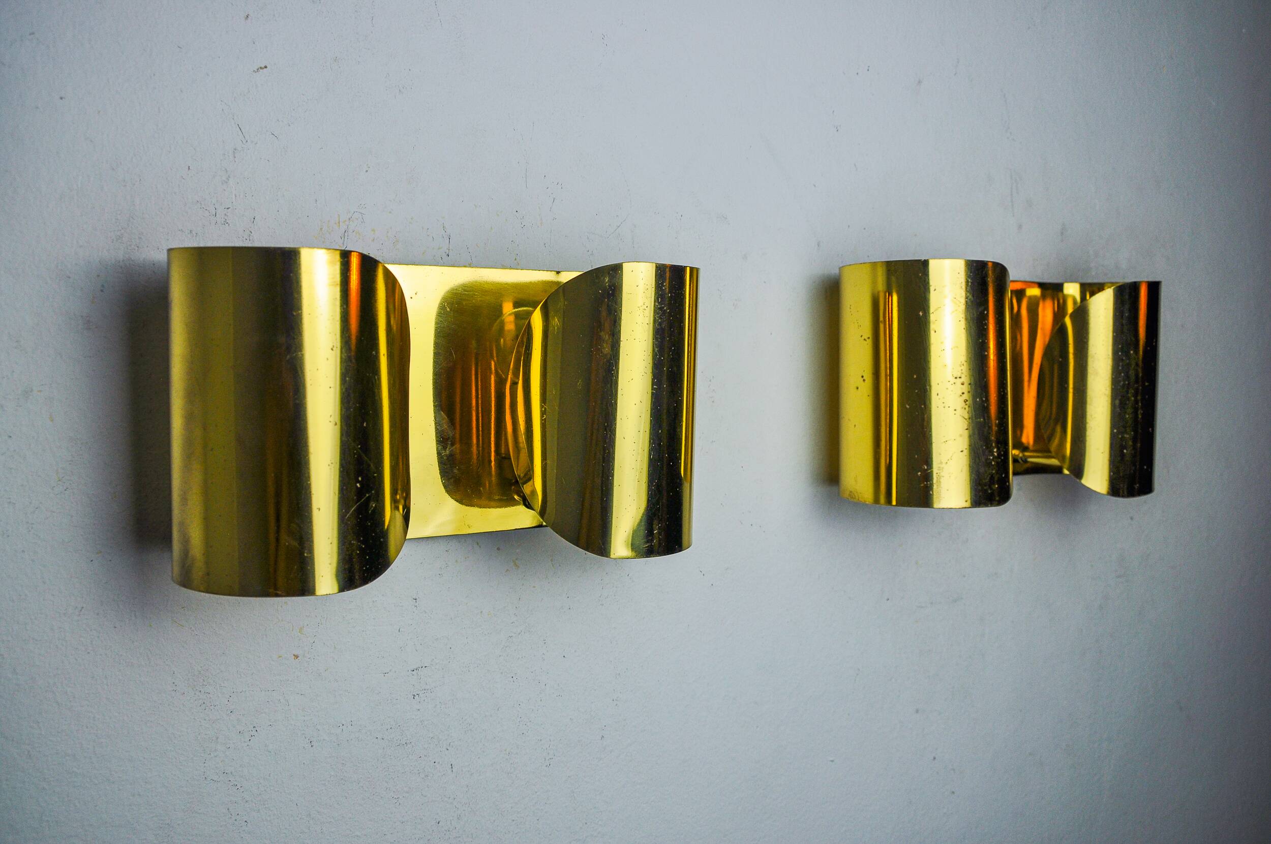 Pair of "Foglios" brass wall lights, Italy, 1970