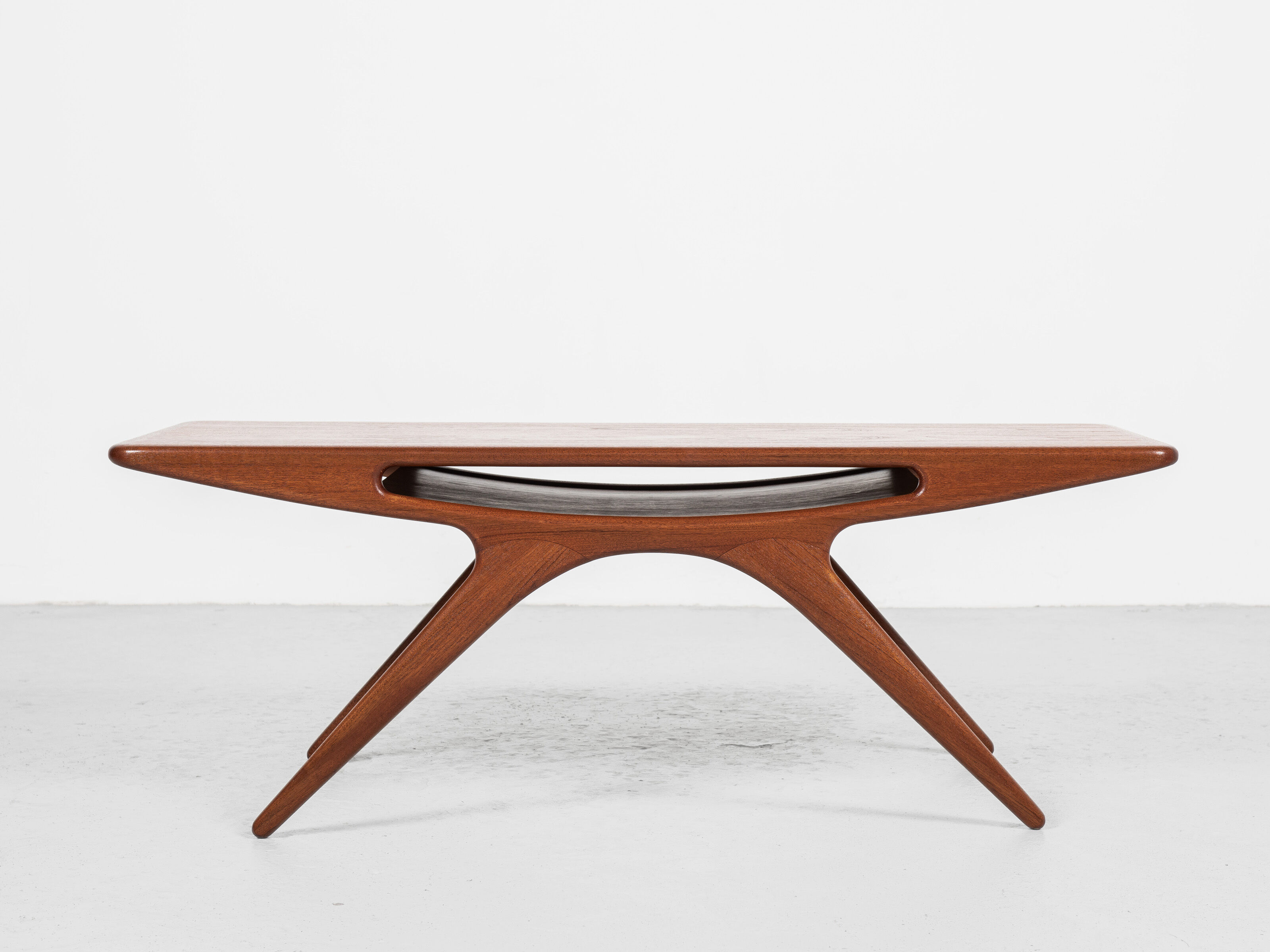 Midcentury danish smile coffee table in teak by johannes andersen for silkeborg 1950s