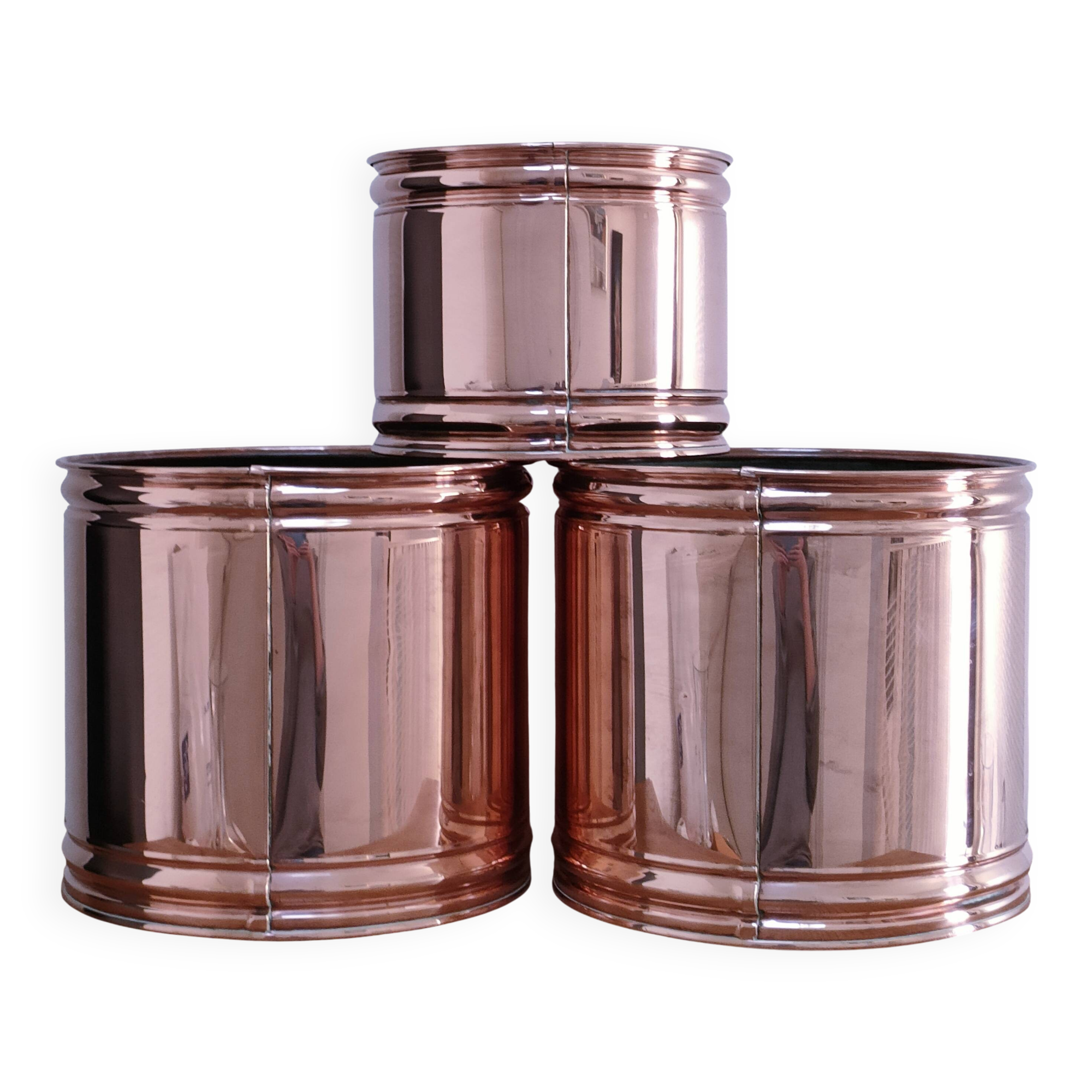 three cylindrical plant pots in a Scandinavian design from the 80s