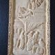 Sculpted resin plaque in the style of China.