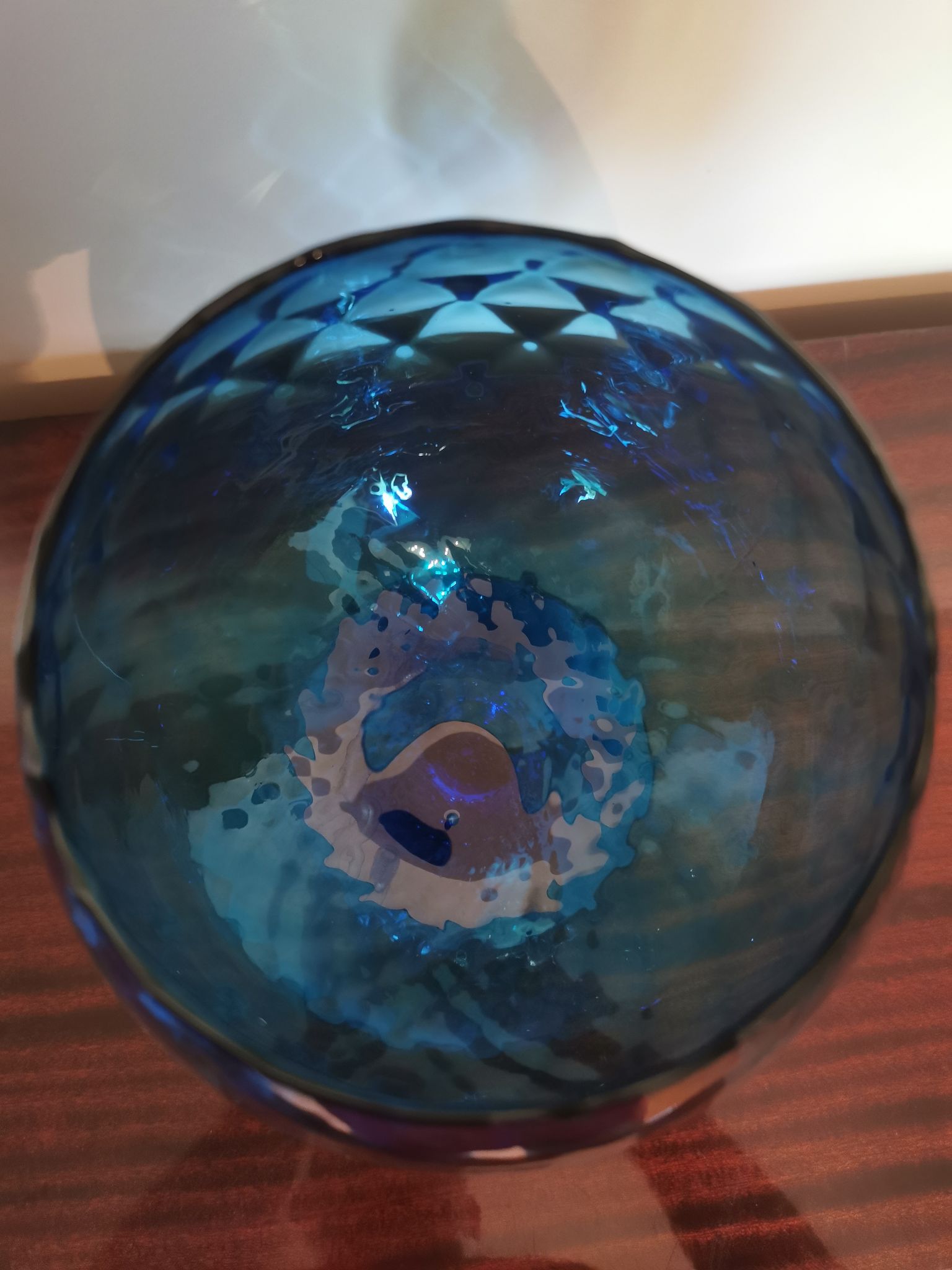 Vintage vase in light blue glass.