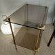 Table moderniste laiton et verre fumé-esprit galerie années 70