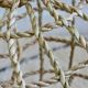 Suspension fishing net braided in palm leaf
