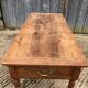 Antique cherry farmhouse table with 2 drawers and 1 pull-out