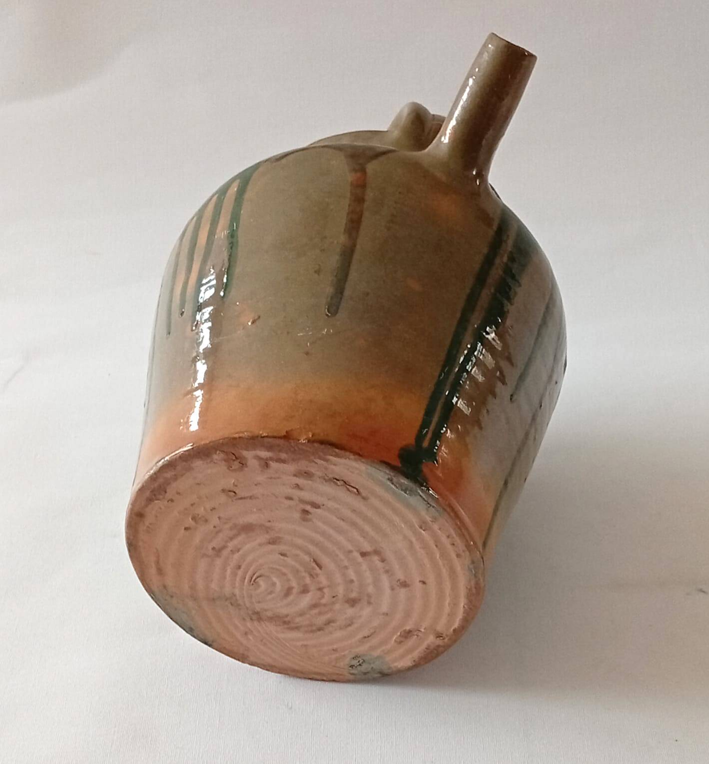 Glazed stoneware jug with drips