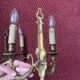 two brass wall sconces