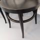 Set of 4 vintage Mouette chairs by Baumann in black wood from the 1960s.