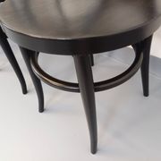 Set of 4 vintage Mouette chairs by Baumann in black wood from the 1960s.
