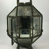Metal and brass wall light with mirror background 1900