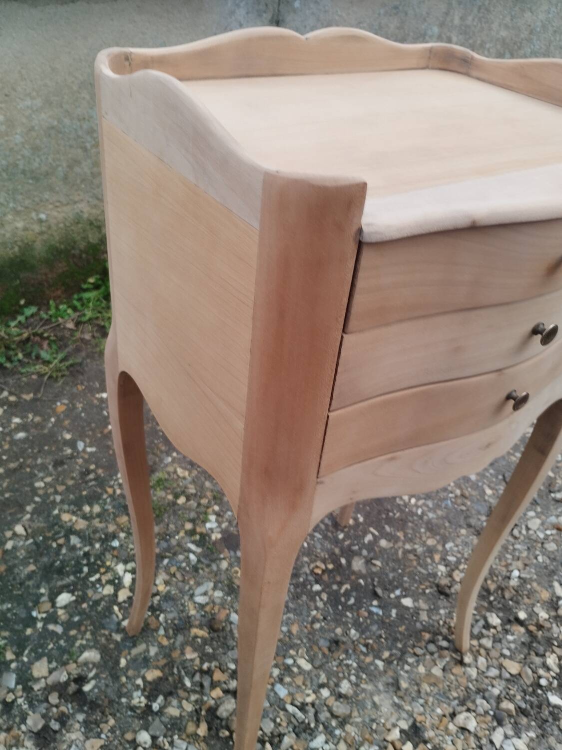 Pair of antique wooden bedside tables in Louis XV style.
