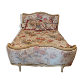 Double bed in Louis XV style – Patinated wood and floral fabric