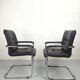 Paire de fauteuils de bureau cuir et structure tubulaire chromé