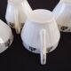 6 tasses à café et sous-tasses en porcelaine fine Art Déco