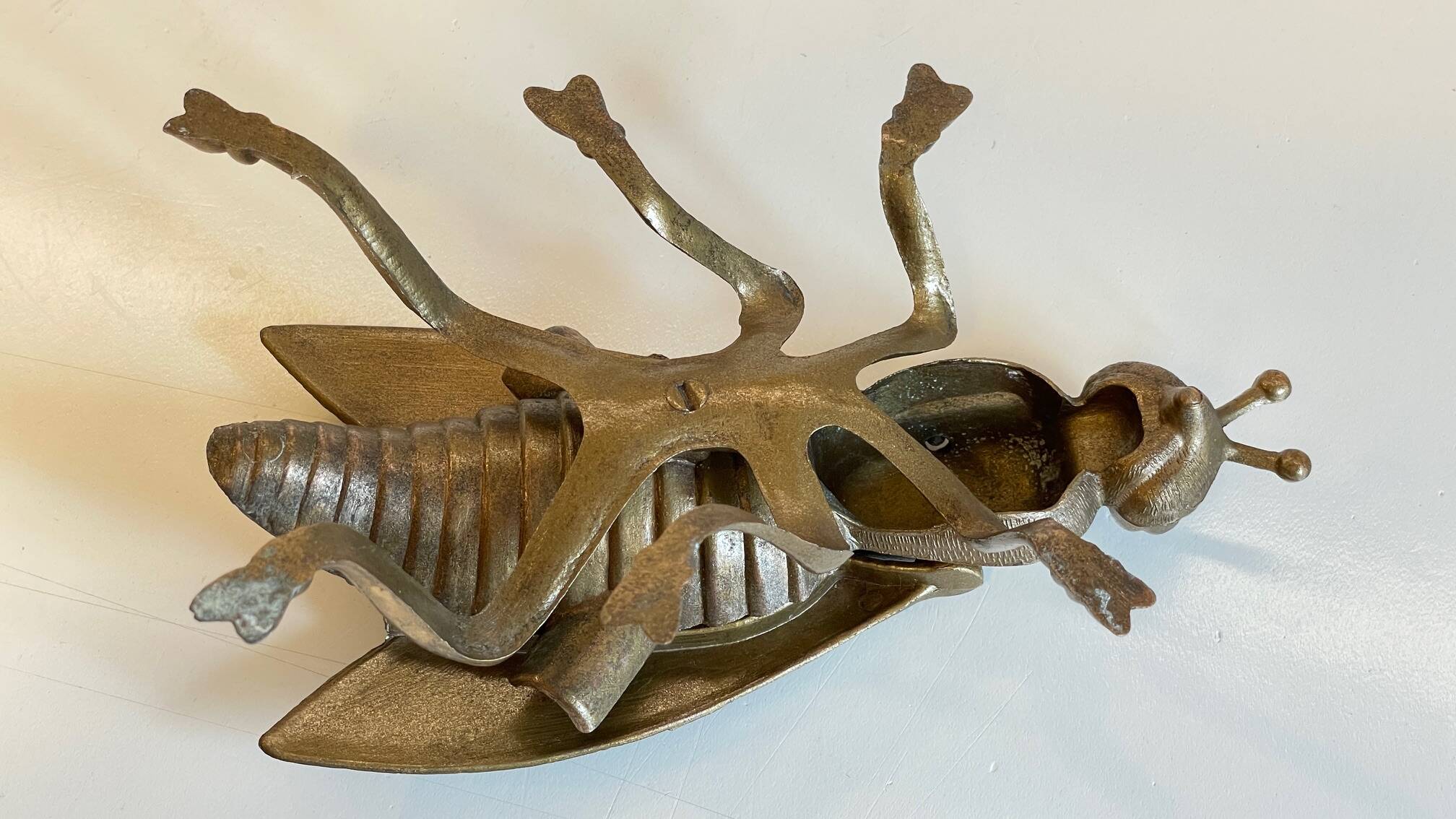 Vintage fly ashtray in patinated metal