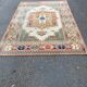 Large oriental wool rug with terracotta geometric patterns 200x300cm