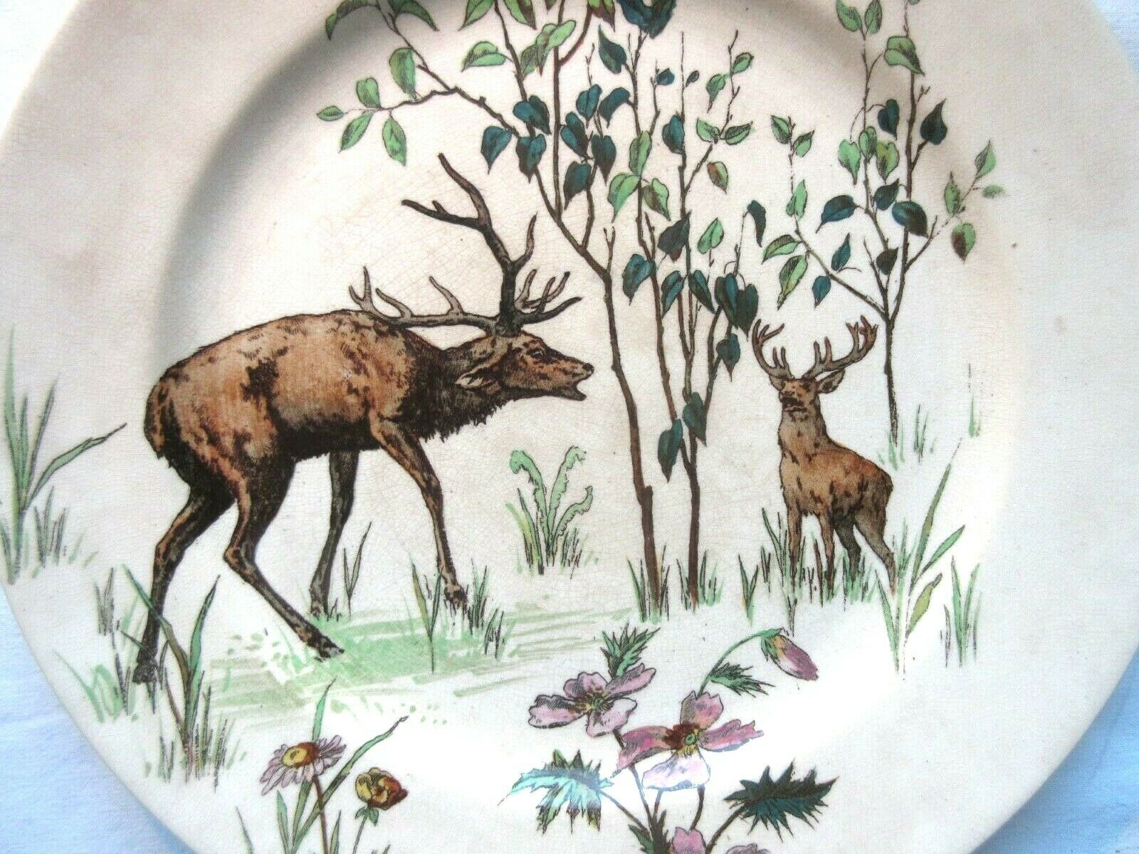 Assiette doulton, grands dépôts de paris: la confrontation des cerfs