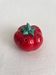 Vintage tomato salt or pepper shaker in slip