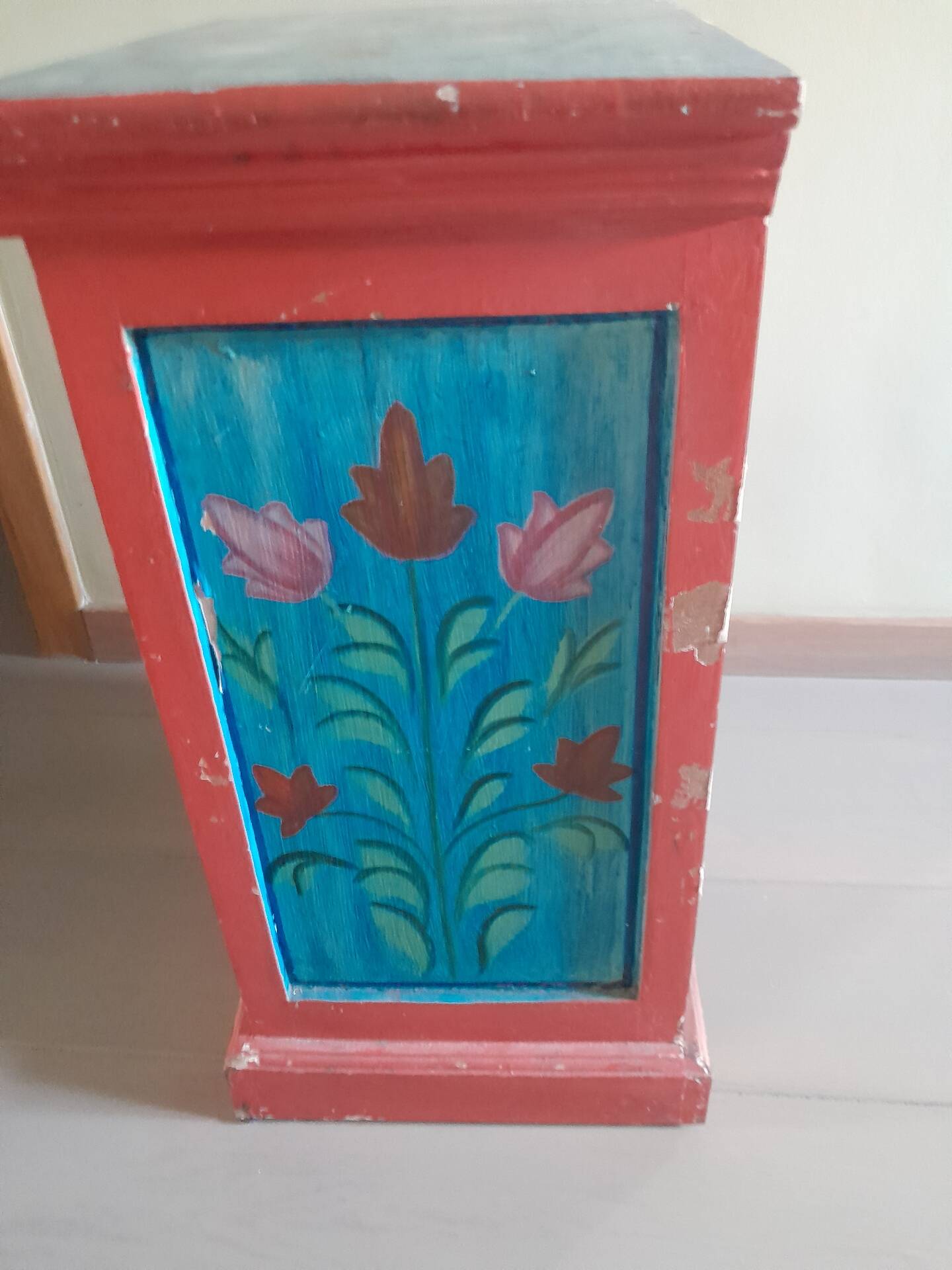Painted wooden piece of furniture