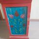 Painted wooden piece of furniture