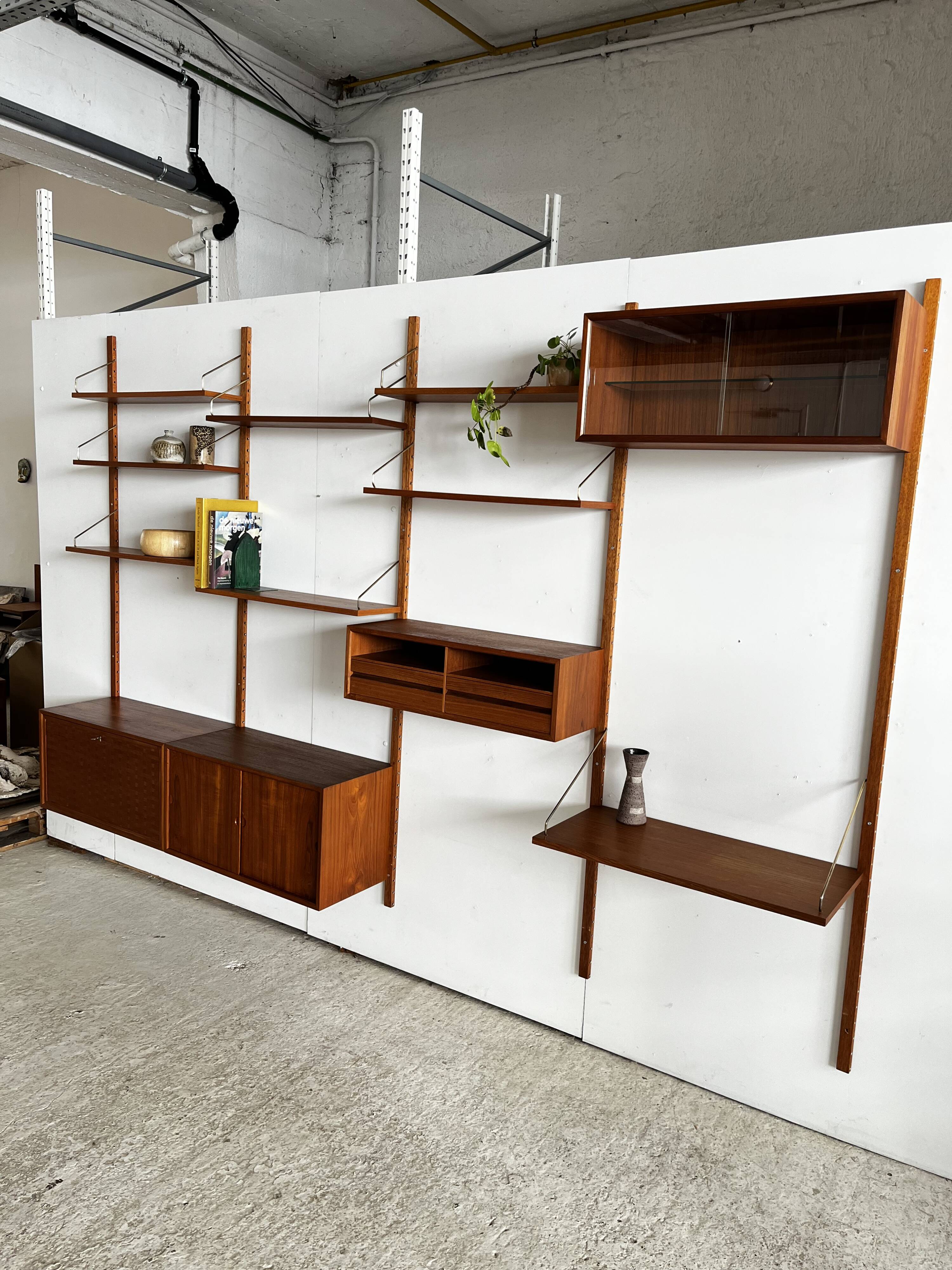 A wall unit with 4 compartments by Poul Cadovius, Denmark, 1960s.
